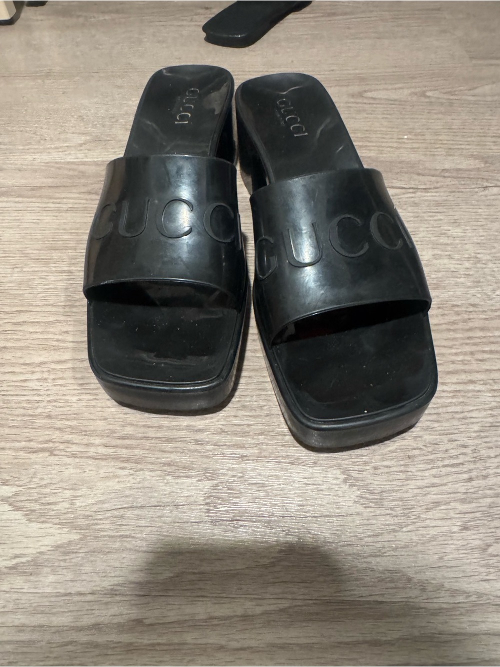 Gucci Black Embossed Logo Slide Sandals